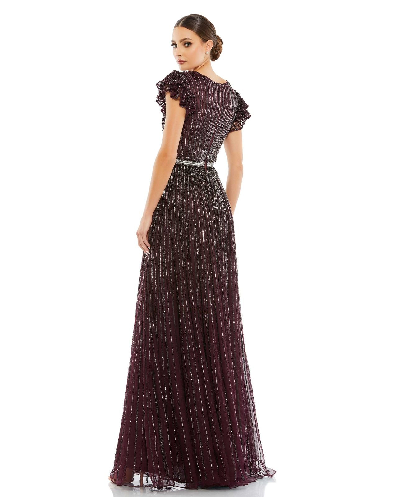 Sequined wrap over ruffled cap sleeved gown